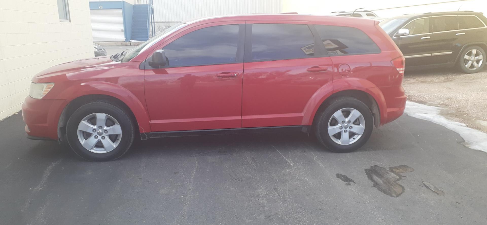 2013 Dodge Journey SE (3C4PDCAB4DT) with an 2.4L L4 DOHC 16V engine, 4-Speed Automatic transmission, located at 2015 Cambell Street, Rapid City, SD, 57701, (605) 342-8326, 44.066433, -103.191772 - Photo#0